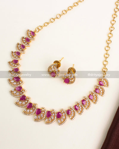 Ruby CZ short necklace set with gold polish and matching earrings.