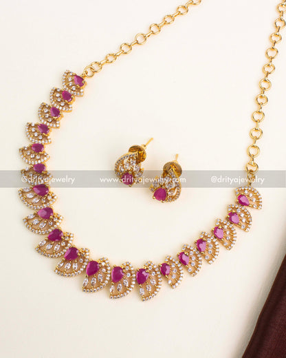 Ruby CZ short necklace set with gold polish and matching earrings.