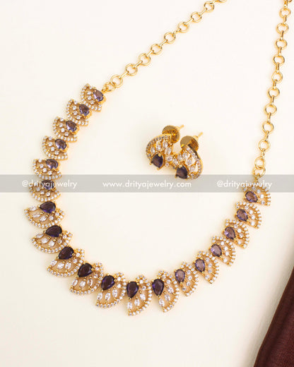 Purple CZ short necklace with gold polish and matching stud earrings.