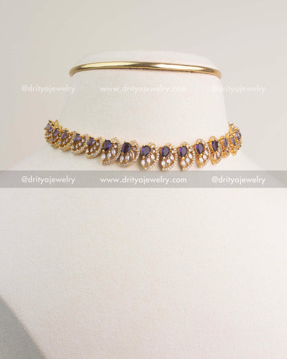 Purple CZ short necklace with gold polish and matching stud earrings.
