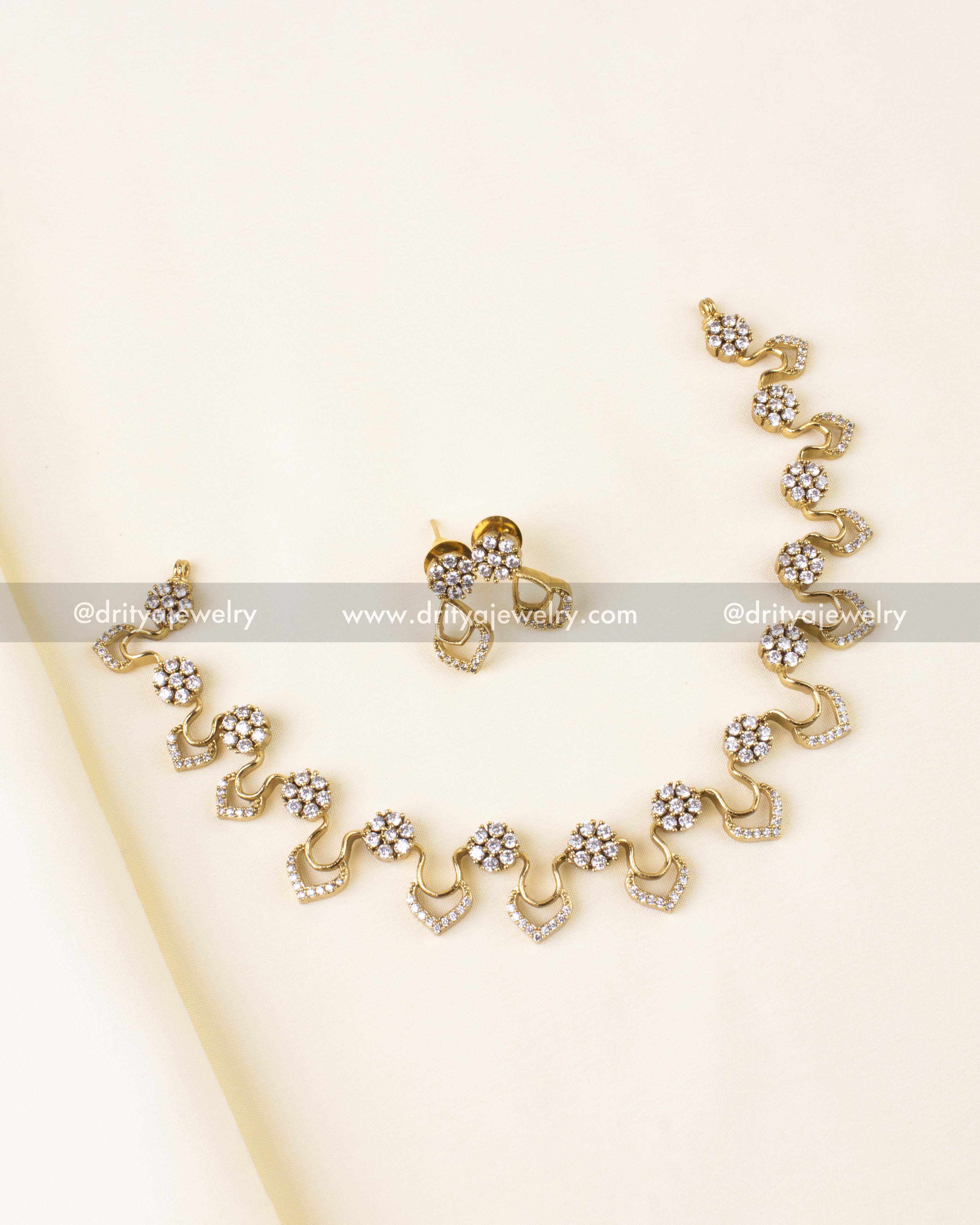 Short necklace set with cluster CZ stones and gold chevron links