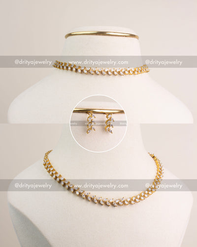 Gold-plated climber necklace set with marquise-cut CZ stones and matching earrings.
