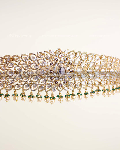 Intricate lattice pattern waist belt featuring diamond replica stones and lavender centerpiece.