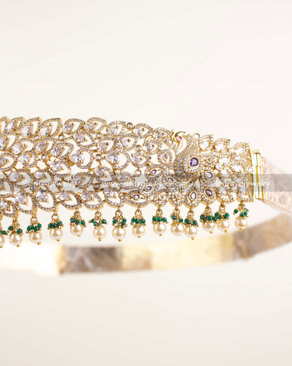 Side view of bridal waist belt showing CZ stone detailing, green bead and pearl accents.