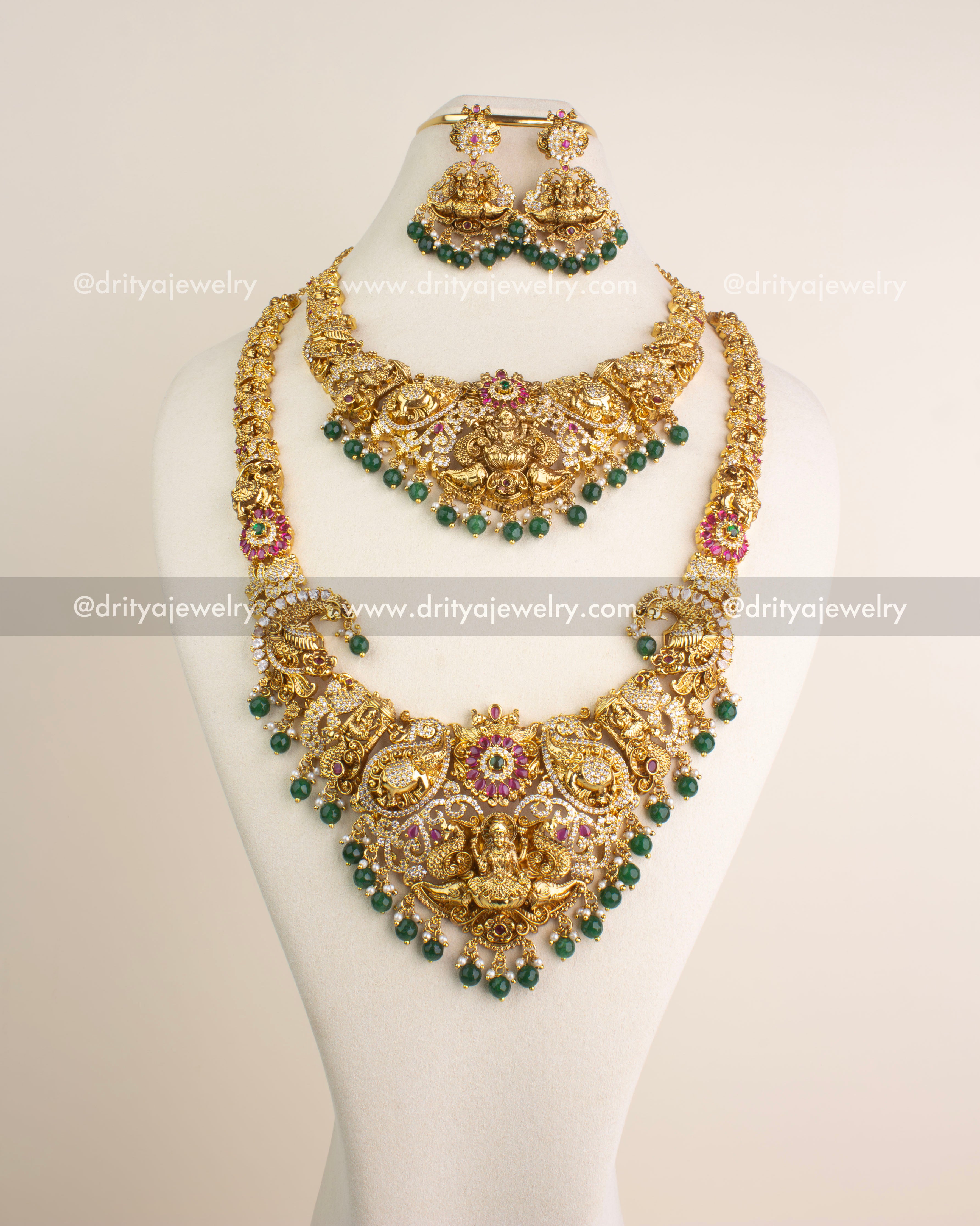 Temple jewelry combo set including long necklace, short necklace, and danglers with Lakshmi motifs and green bead hangings.