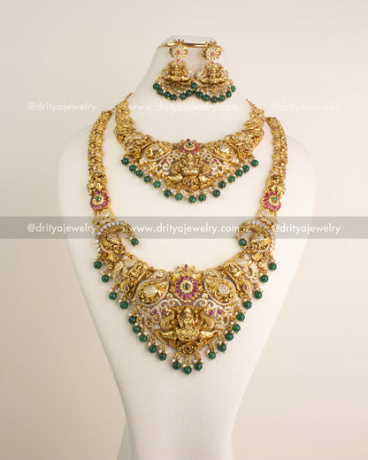 Temple jewelry combo set including long necklace, short necklace, and danglers with Lakshmi motifs and green bead hangings.