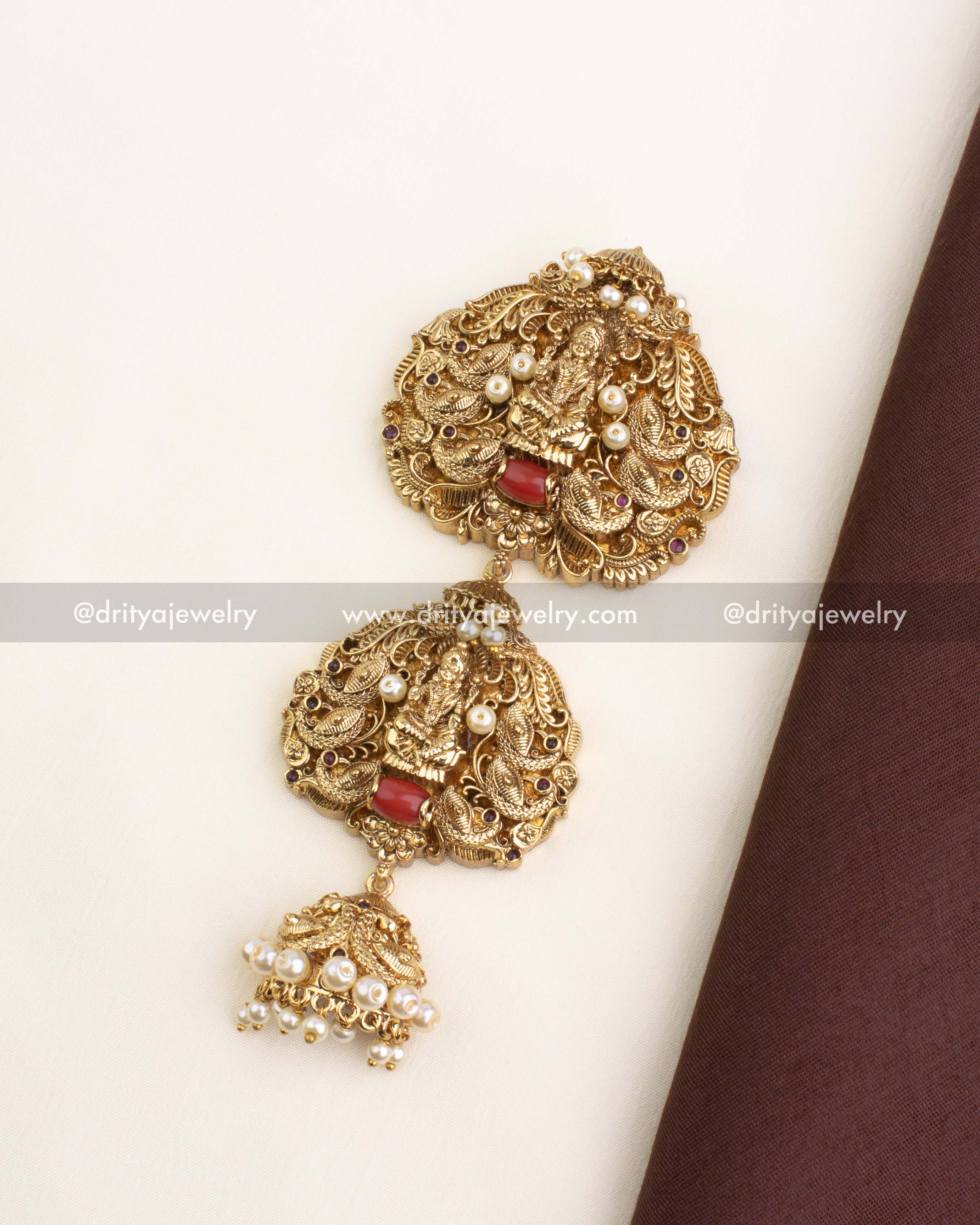 Top-down view of temple-style Premium Nakshi Jada Billa with coral bead and pearls