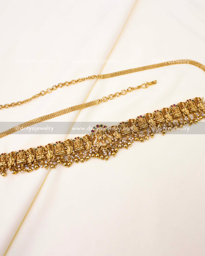 Premium Nakshi Temple Hip Belt with goddess motifs and pearl drops in antique gold polish.