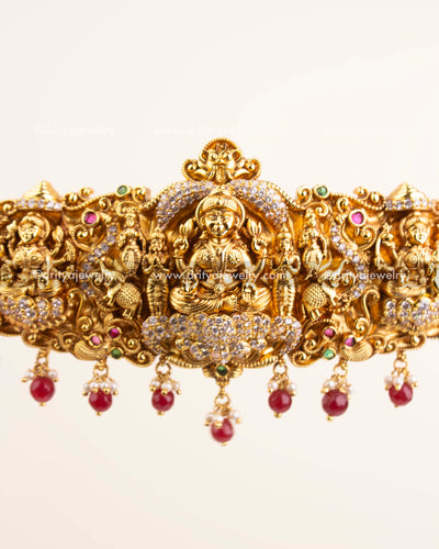 Detailed temple goddess design with CZ stones and ruby red beads.