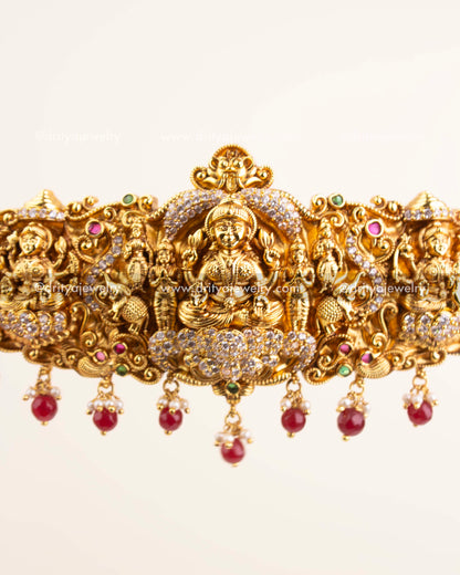 Detailed temple goddess design with CZ stones and ruby red beads.