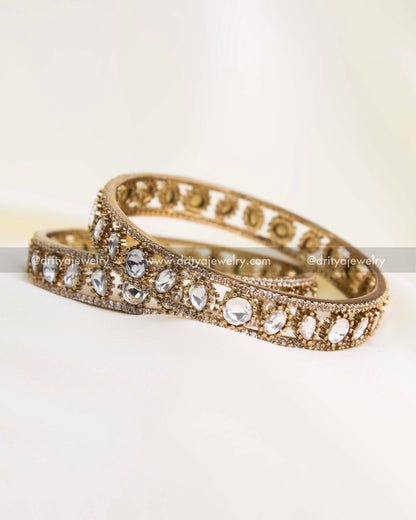 Pair of antique gold Polki Kundan bangles with uncut Moissanite-look stones.