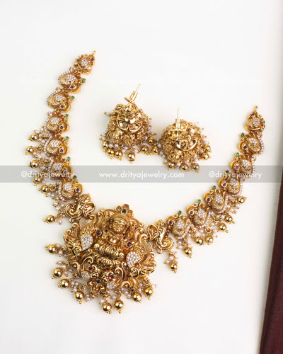 Temple short necklace set with Lakshmi pendant, peacock motifs, and nakshi detailing.