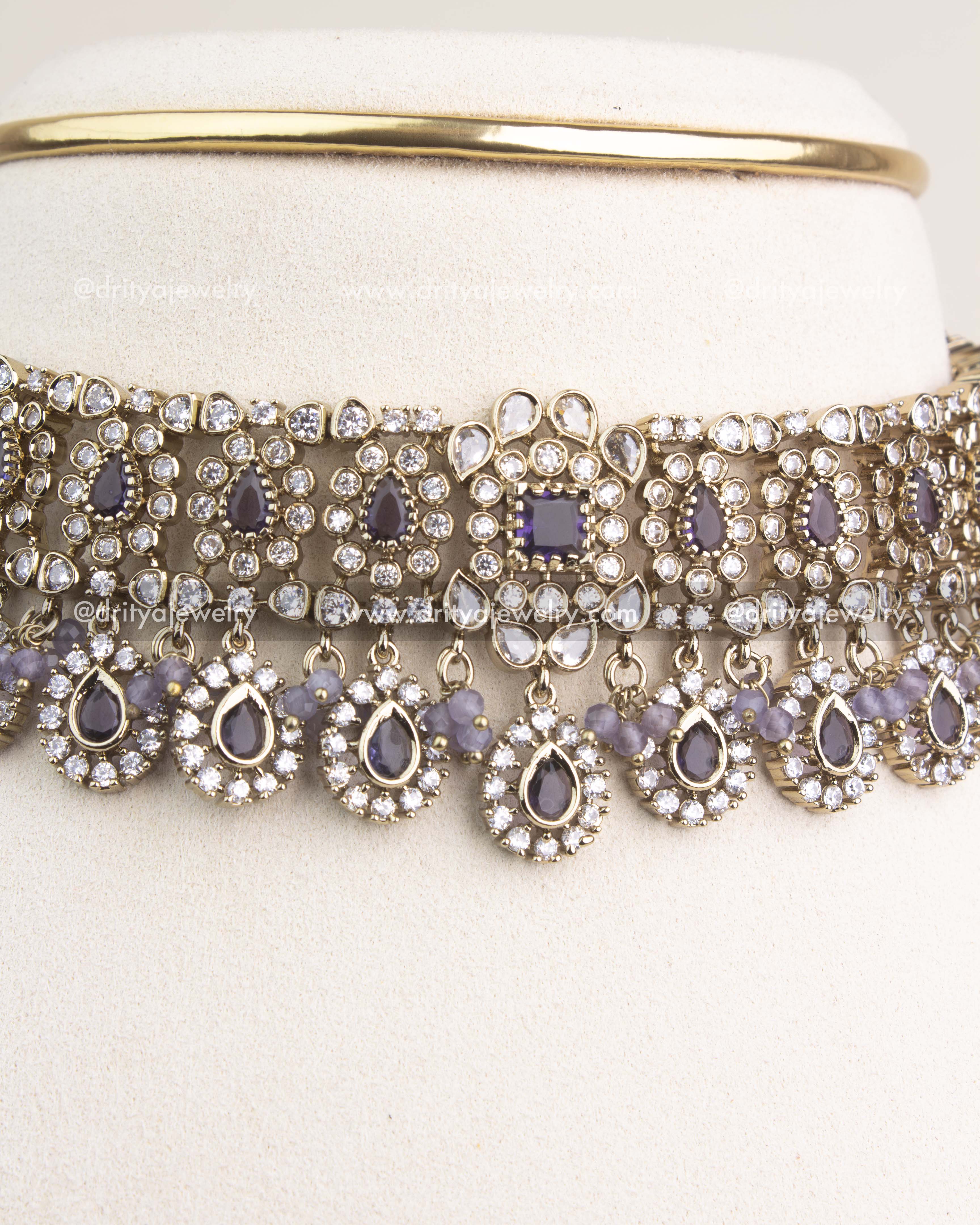 Close-up of Victorian choker featuring purple stones and intricate CZ craftsmanship.
