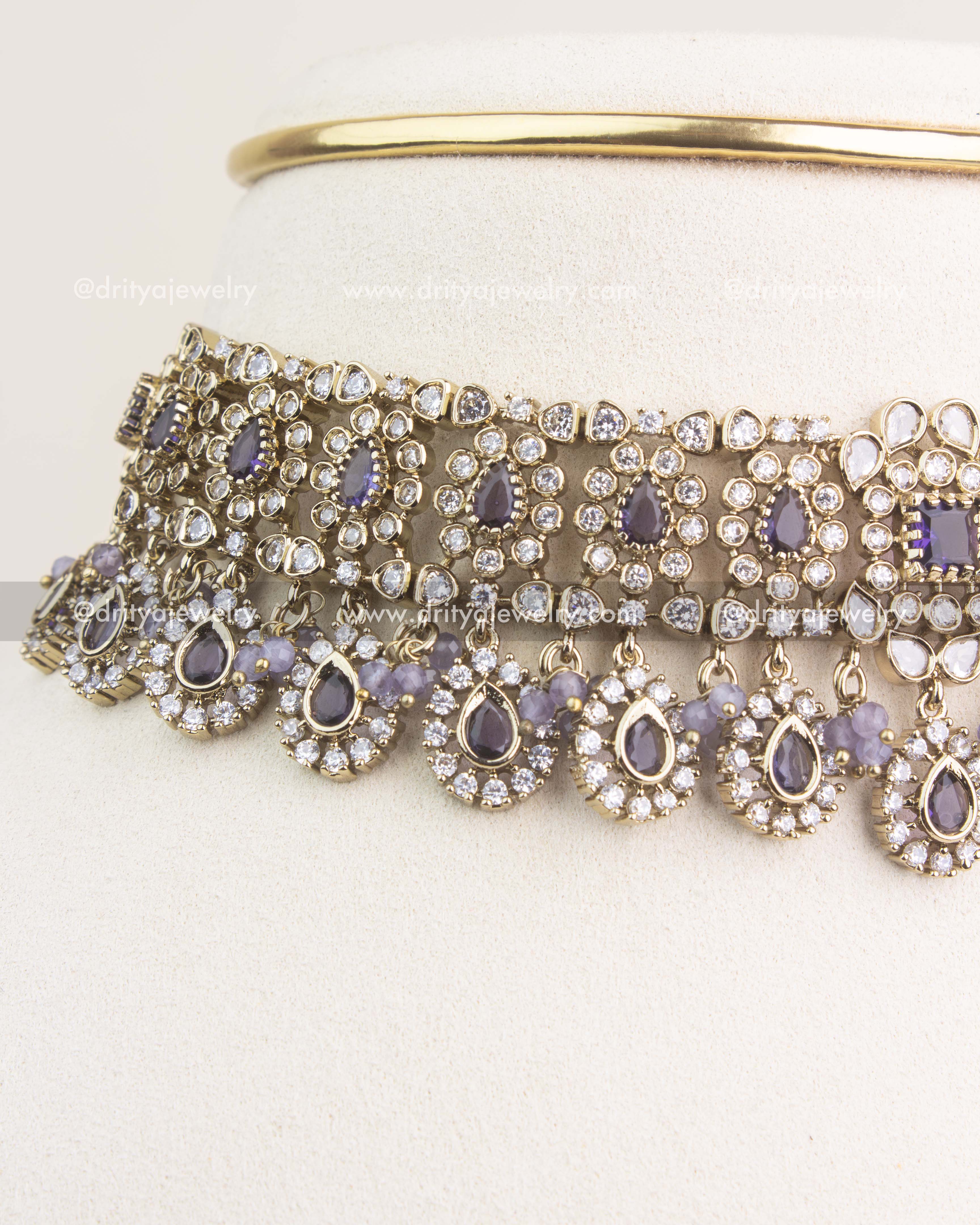 Side view showing layered stone setting and antique gold Victorian polish.