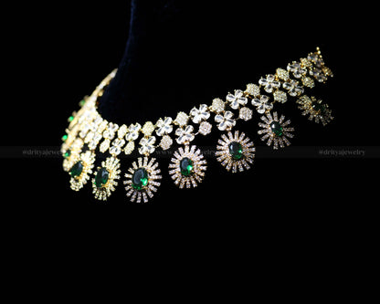 Different side perspective showcasing the intricate craftsmanship and luster of the CZ and emerald stones.