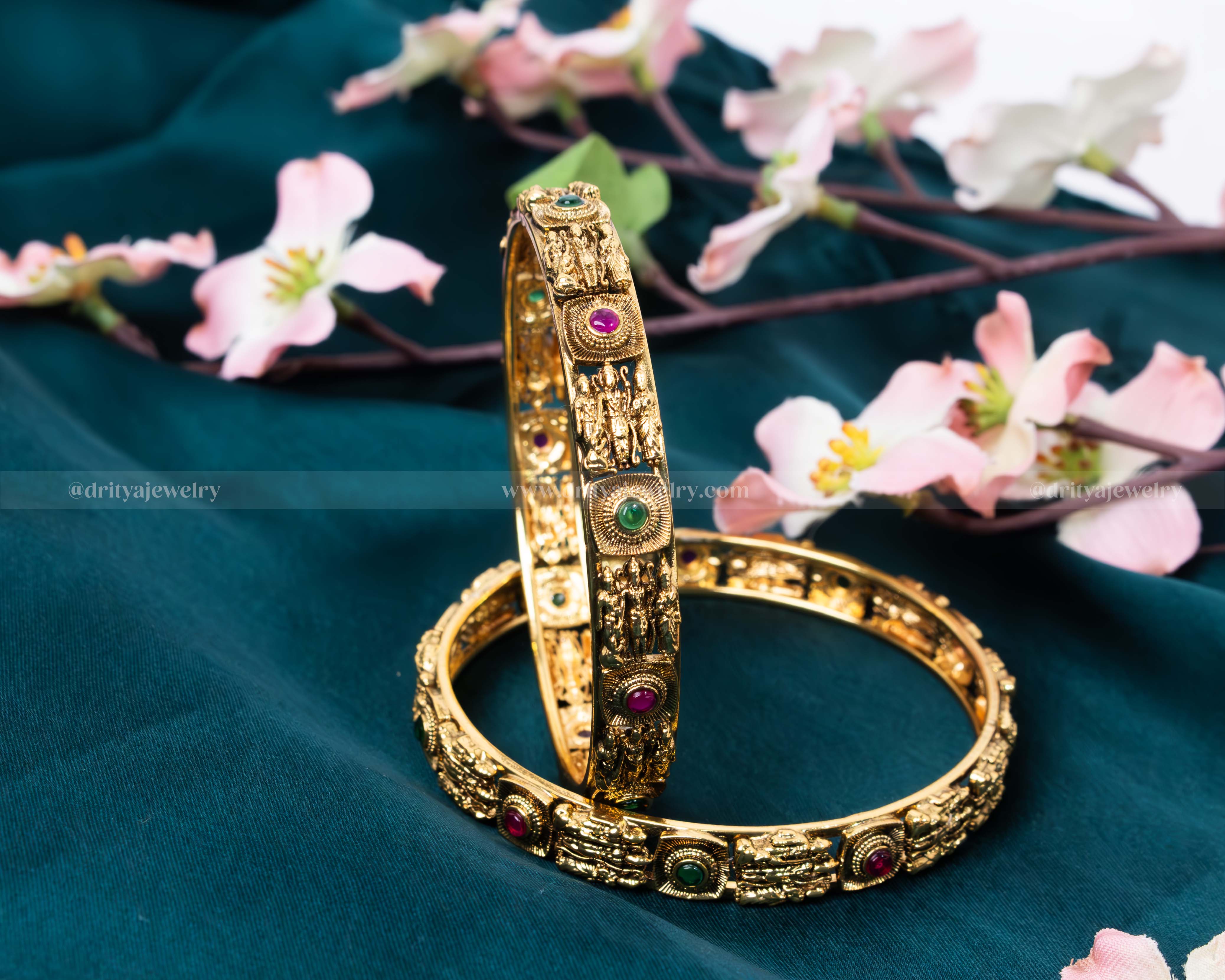 Dritya Jewelry Alt Text: Full view of Ram Parivar Bangle Set showcasing detailed mythological engravings and gemstone embellishments by Dritya Jewelry.