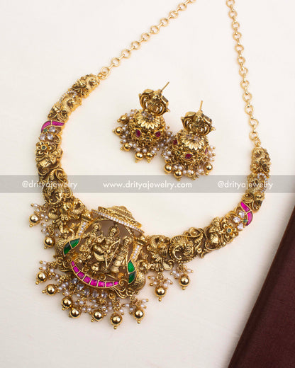 Premium antique short necklace set with Ram Parivar motif, kemp stones, and Nakshi carvings.