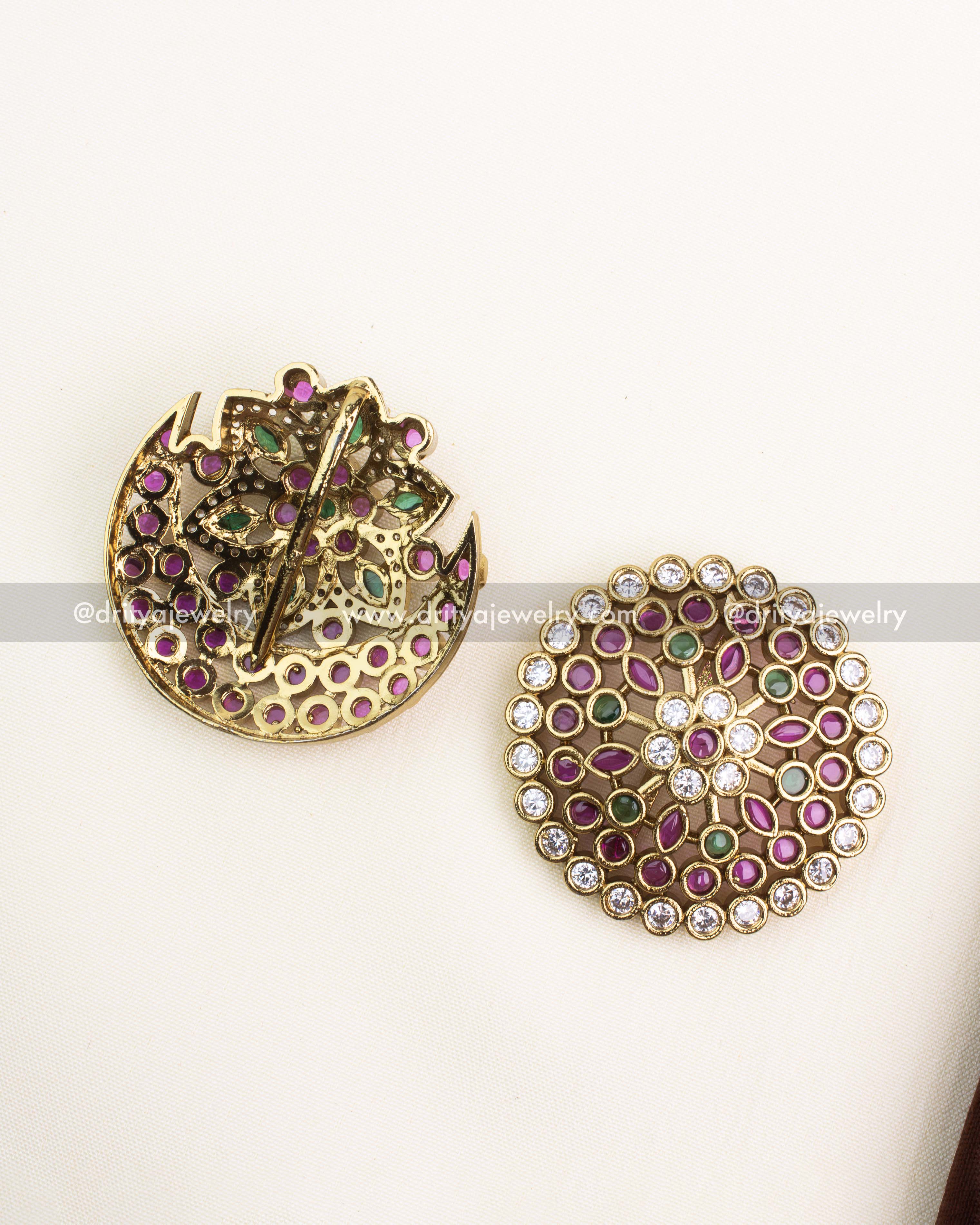 Gold-finished hairpin clasps showing handcrafted detailing and secure lock design.