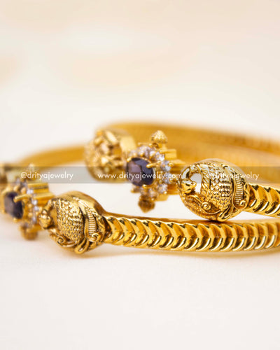 Zoomed-in view of purple centerpiece stone surrounded by white CZs.