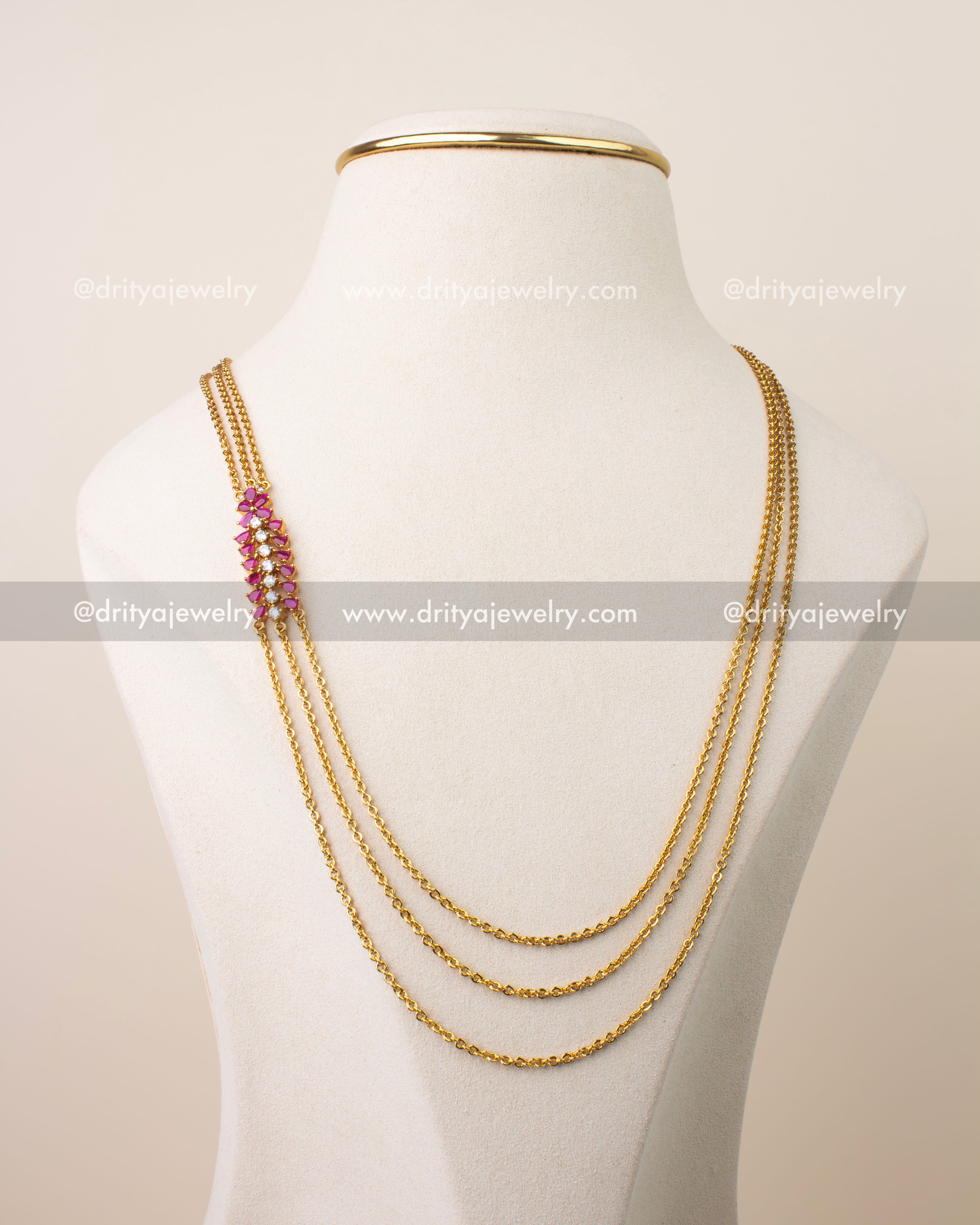 Premium ruby pink chandraharam necklace with high quality CZ stones and triple chain gold polish