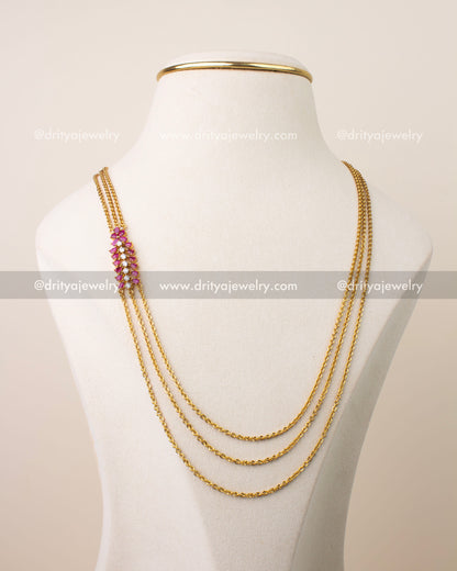 Premium ruby pink chandraharam necklace with high quality CZ stones and triple chain gold polish