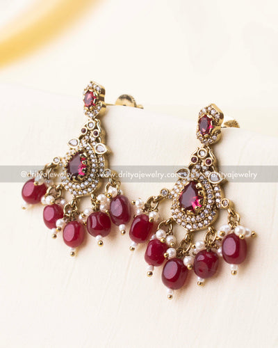 Detailed view of ruby bead drops and AD setting.
