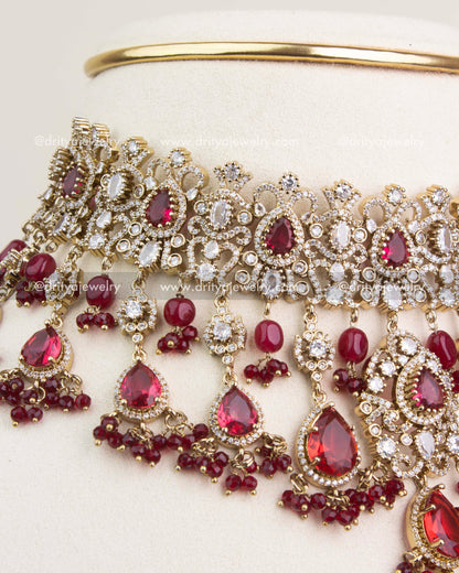 Elegant Ruby Red Victorian choker necklace with statement earrings for bridal wear.