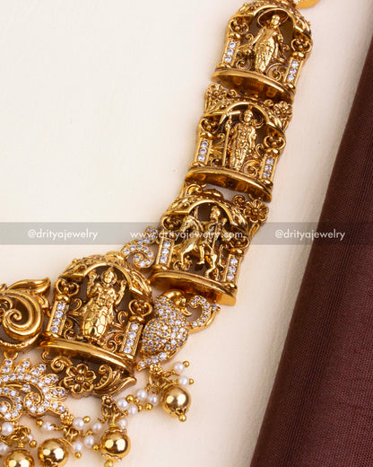 Temple pendant with Krishna motif, yali heads, and pearl beading