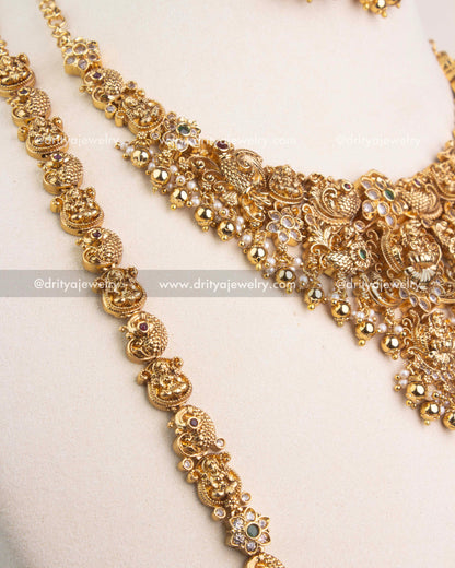 Intricate temple-style chain with embossed deity motifs and floral accents.