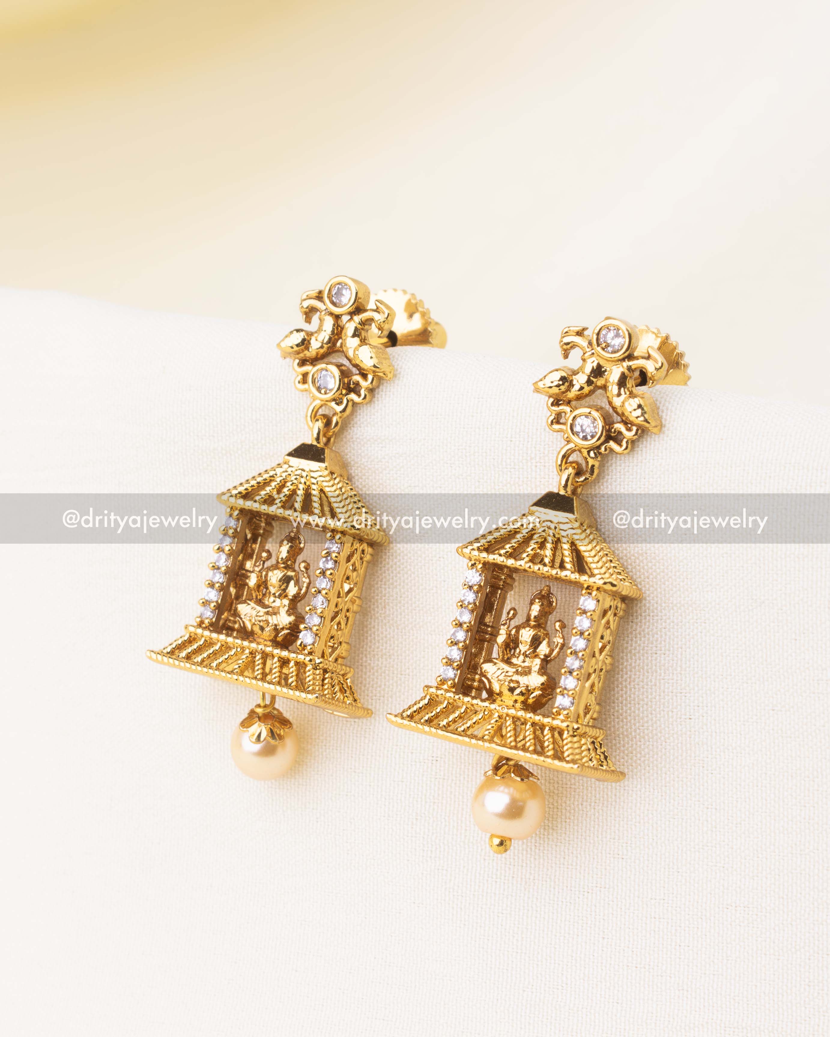 Gold-plated temple earrings featuring Goddess idol, CZ stone accents, and pearl drop.
