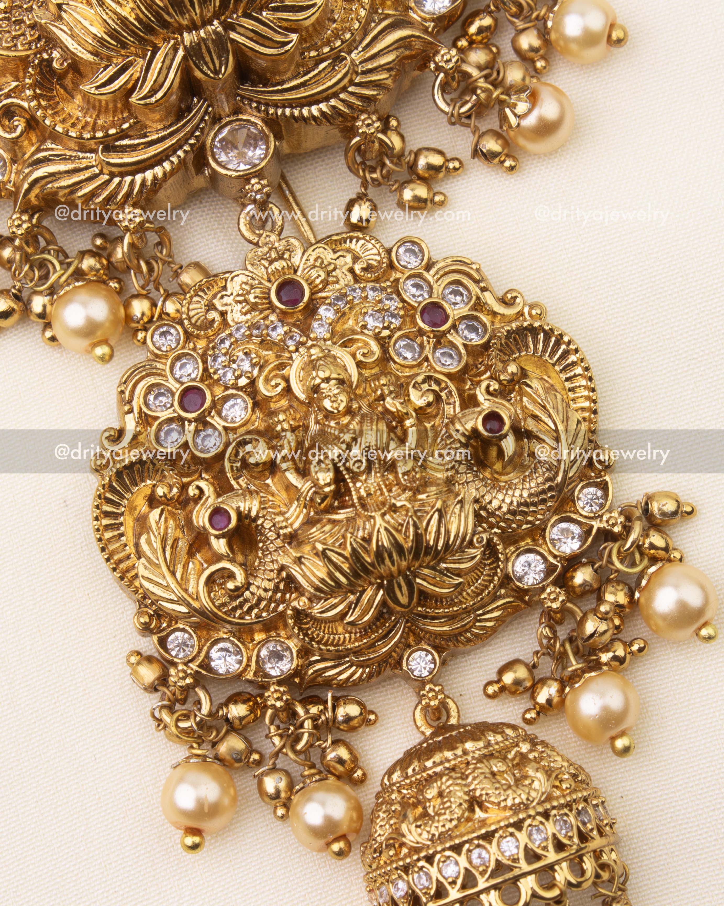 Temple-inspired hair accessory with secure hook for easy wear, embellished with pearls.