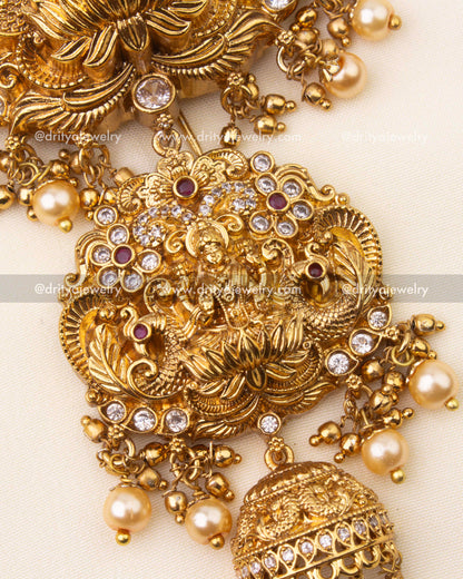 Temple-inspired hair accessory with secure hook for easy wear, embellished with pearls.