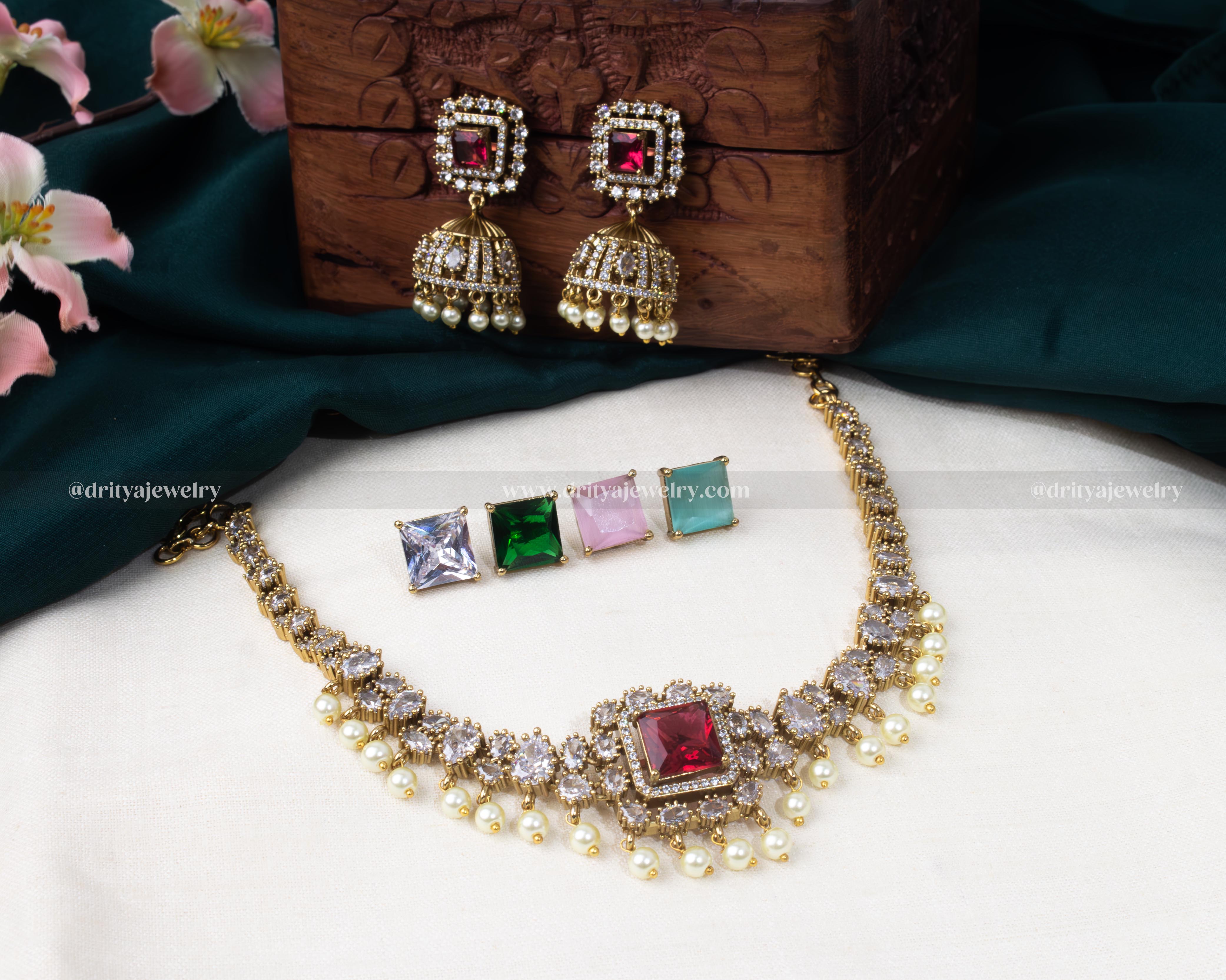 Dritya Jewelry's Interchangeable Necklace Set with customizable stones in Emerald, Baby Pink, Teal, CZ White, and Ruby, perfect for matching with any outfit.