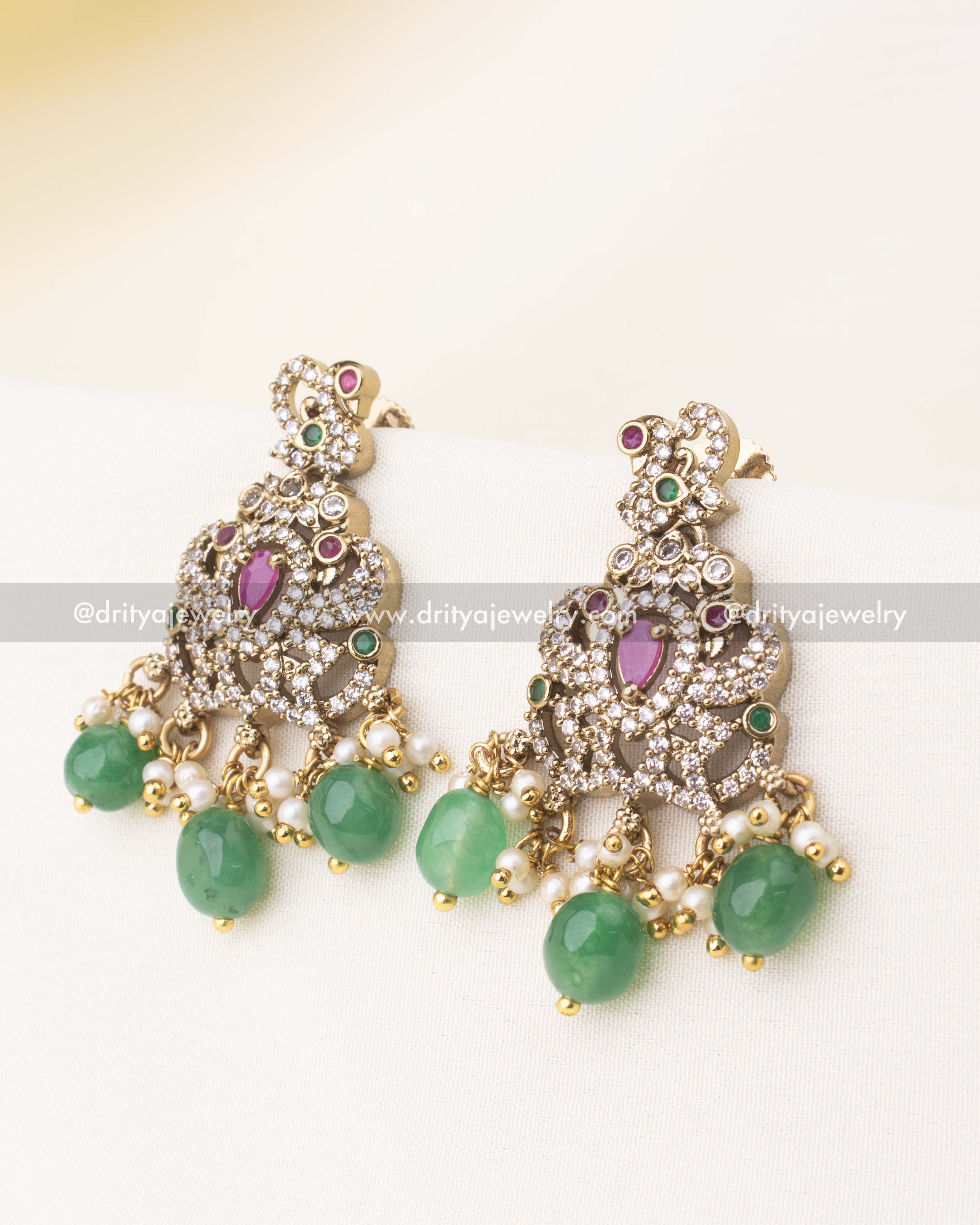 Matching Victorian earrings adorned with CZ stones, ruby accents, pearl clusters, and emerald bead drops.