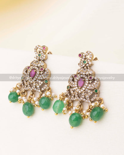 Matching Victorian earrings adorned with CZ stones, ruby accents, pearl clusters, and emerald bead drops.