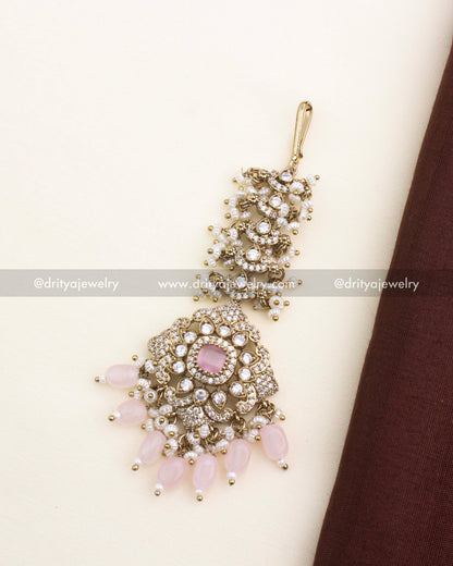 Gold Victorian maang tikka with blush pink stones and pearl danglings.