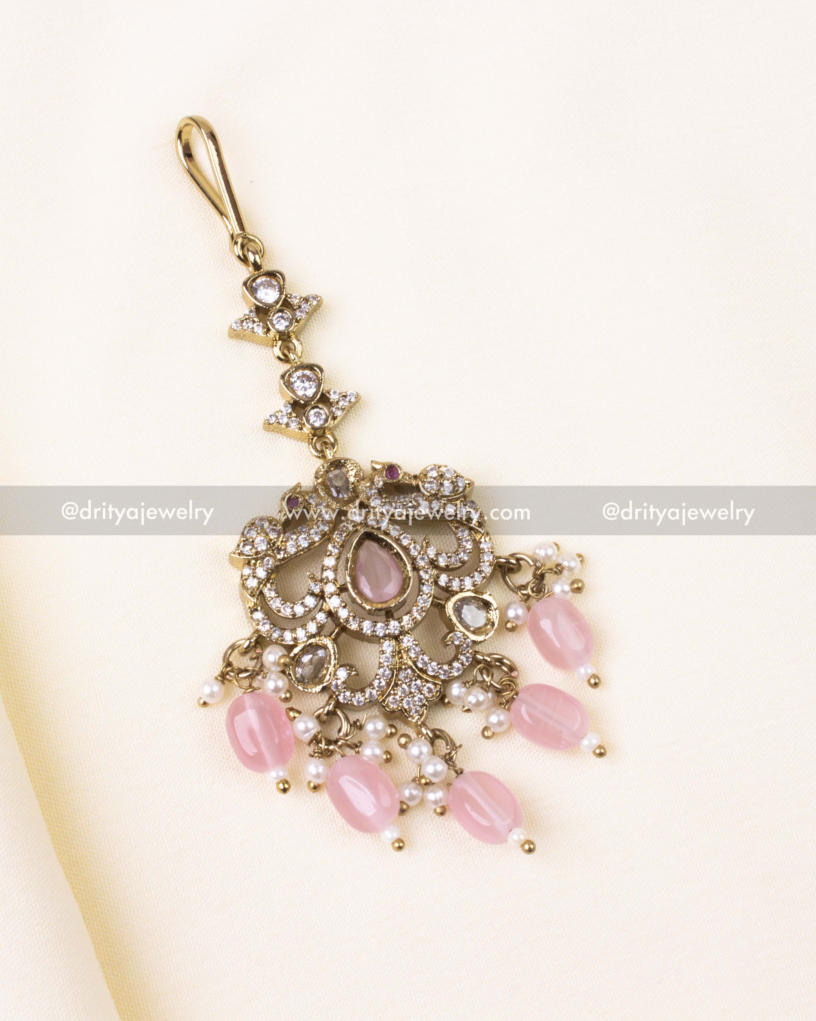Romantic blush pink Victorian tikka with AD stones and bead detailing.