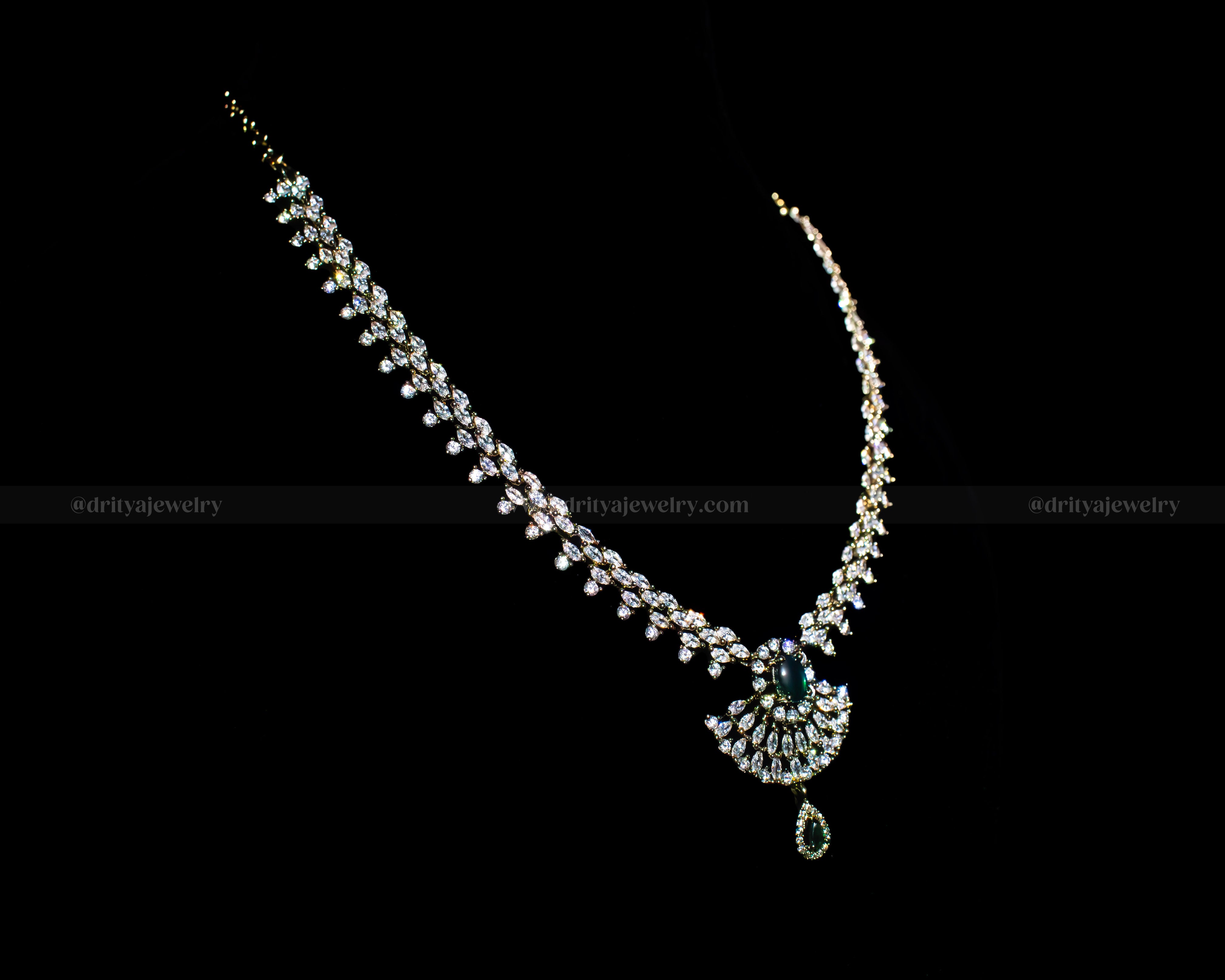 Victorian Necklace Set featuring a delicate teardrop design with green gemstone and CZ stones by Dritya Jewelry, perfect for weddings and special occasions.