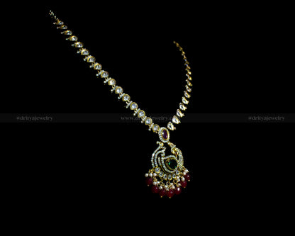 Elegant Victorian necklace set featuring emerald and ruby accents, with a gold-toned chain and crystal embellishments by Dritya Jewelry.