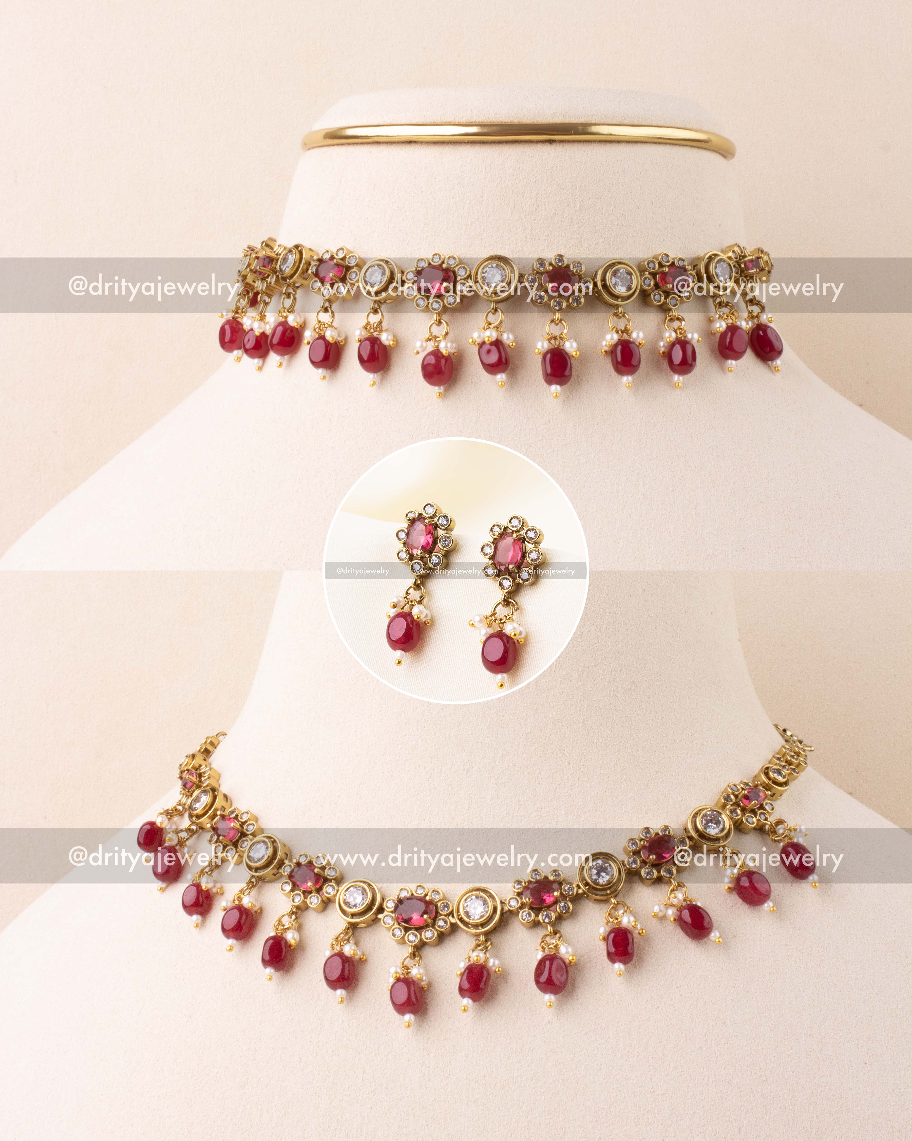 Victorian-style ruby red choker necklace with pearl drops and matching earrings.
