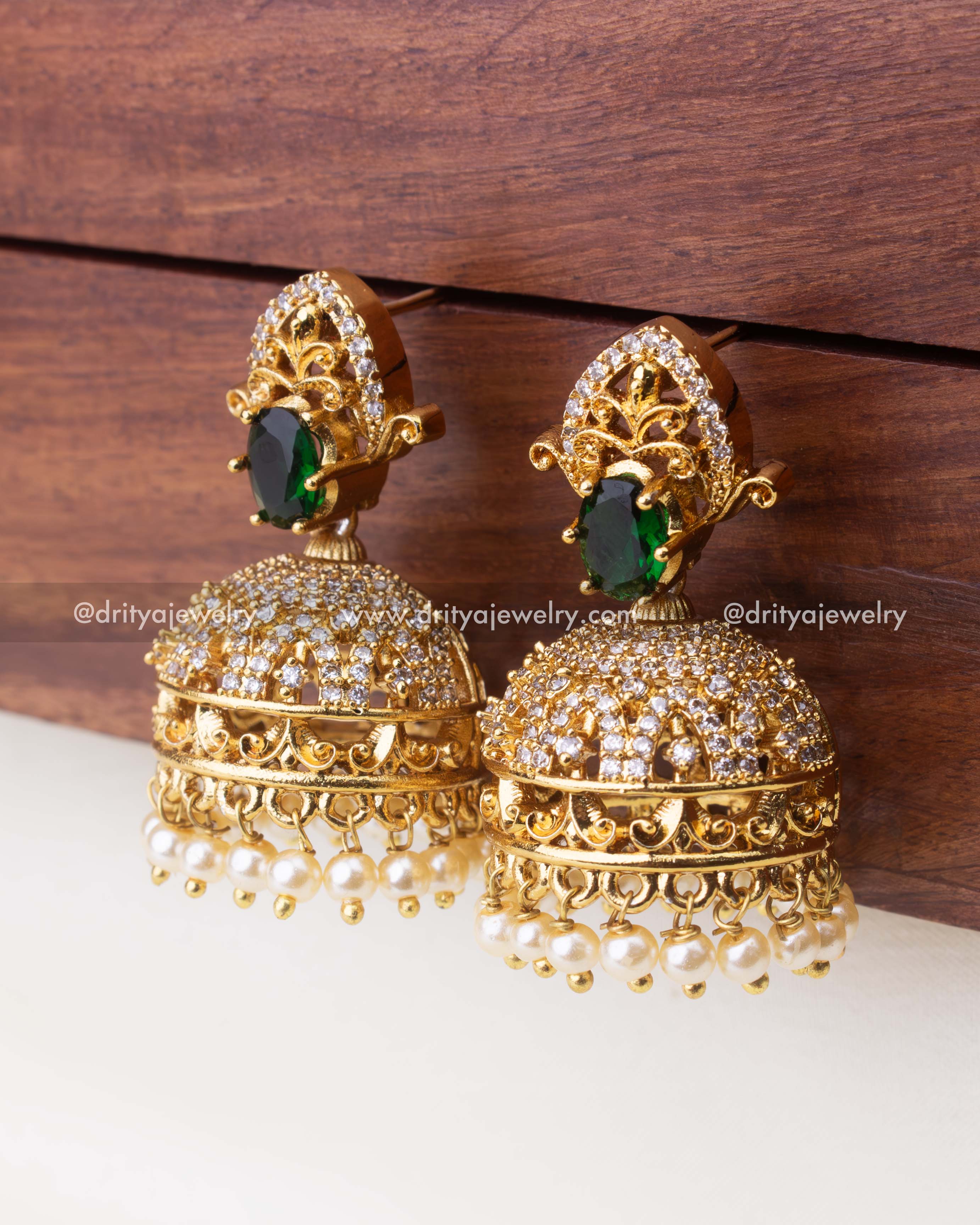Premium Emerald Green CZ Jhumka Earrings with Pearl Drops