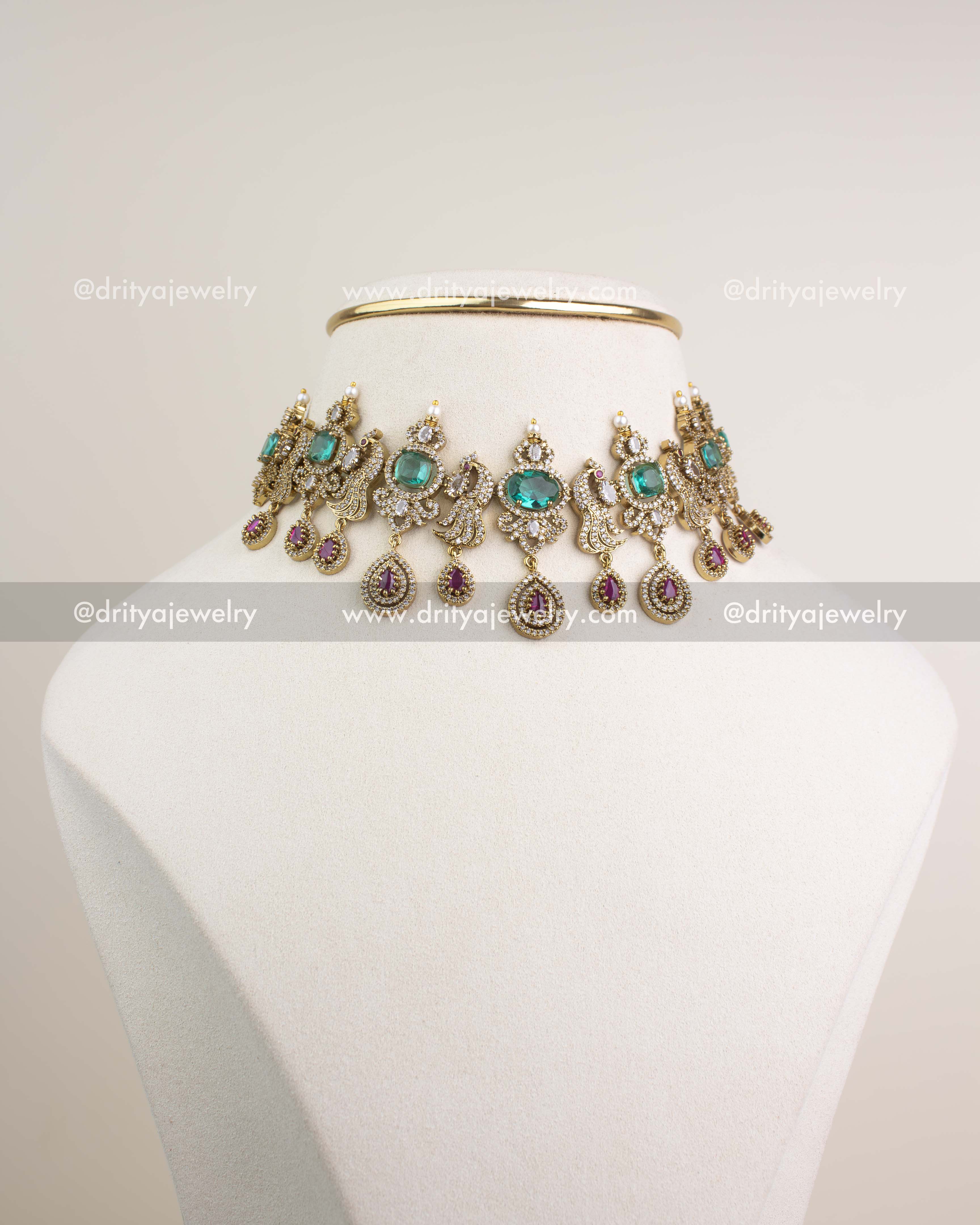 Premium Victorian choker with Russian emerald stones, pearls, and CZ detailing inspired by celebrity Sneha.