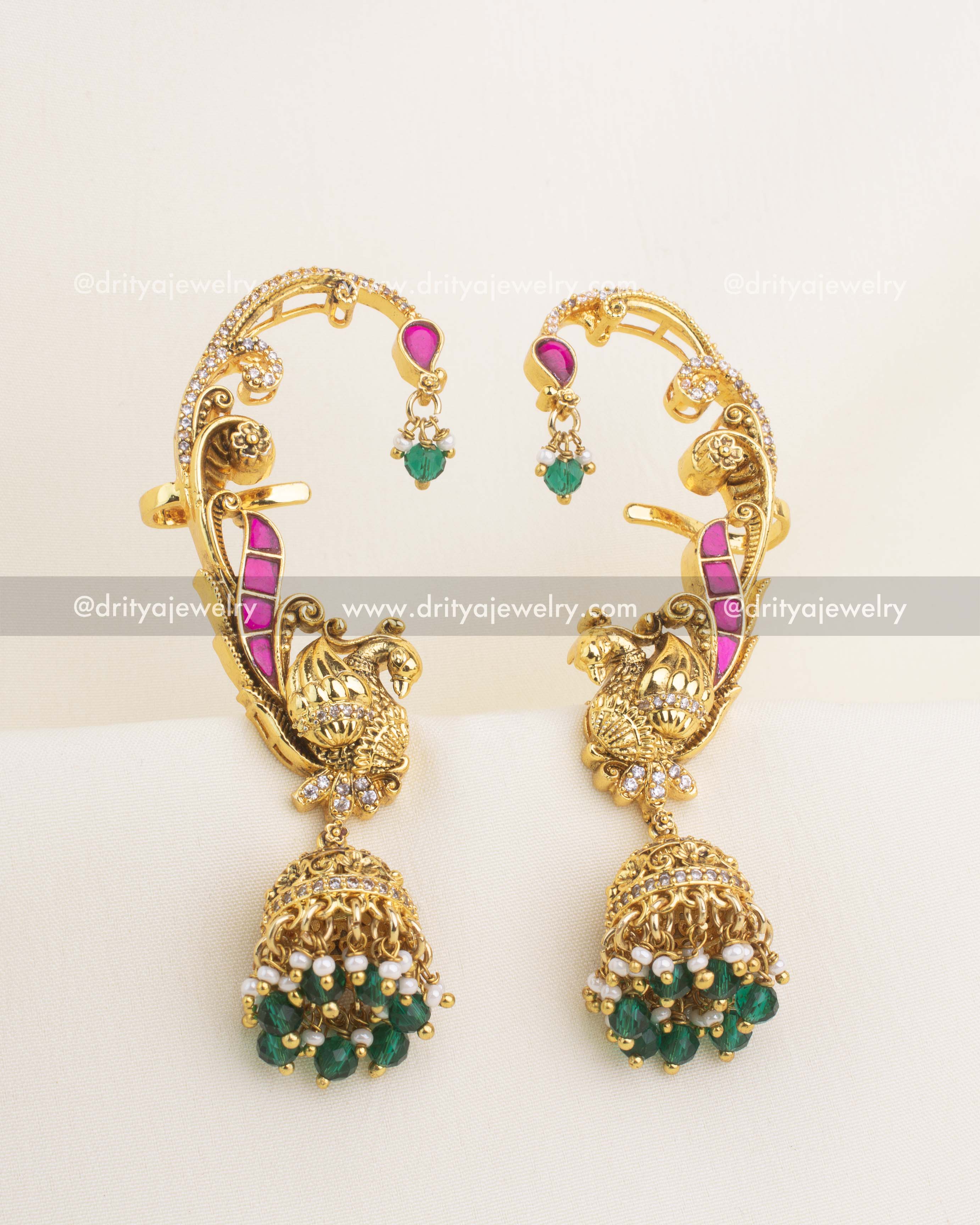 Elegant gold-plated kemp ear cuffs with peacock motif and green bead jhumka drops