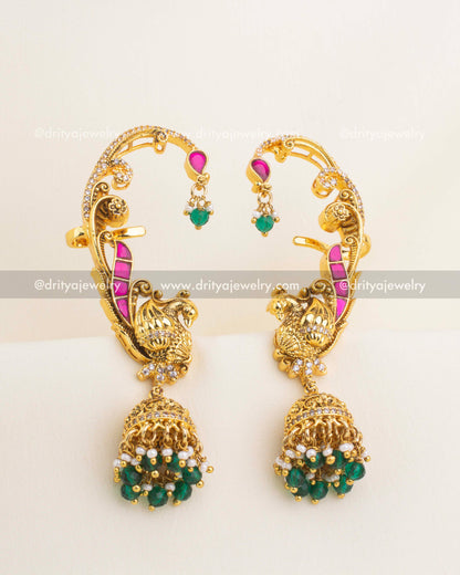 Elegant gold-plated kemp ear cuffs with peacock motif and green bead jhumka drops