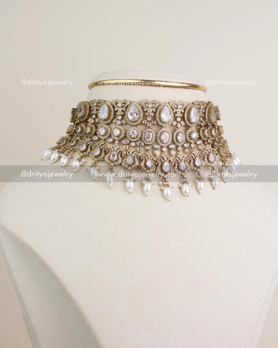 Premium Victorian bridal choker set in Russian emerald with multi-layer detailing, AD stones, and bead droplets.