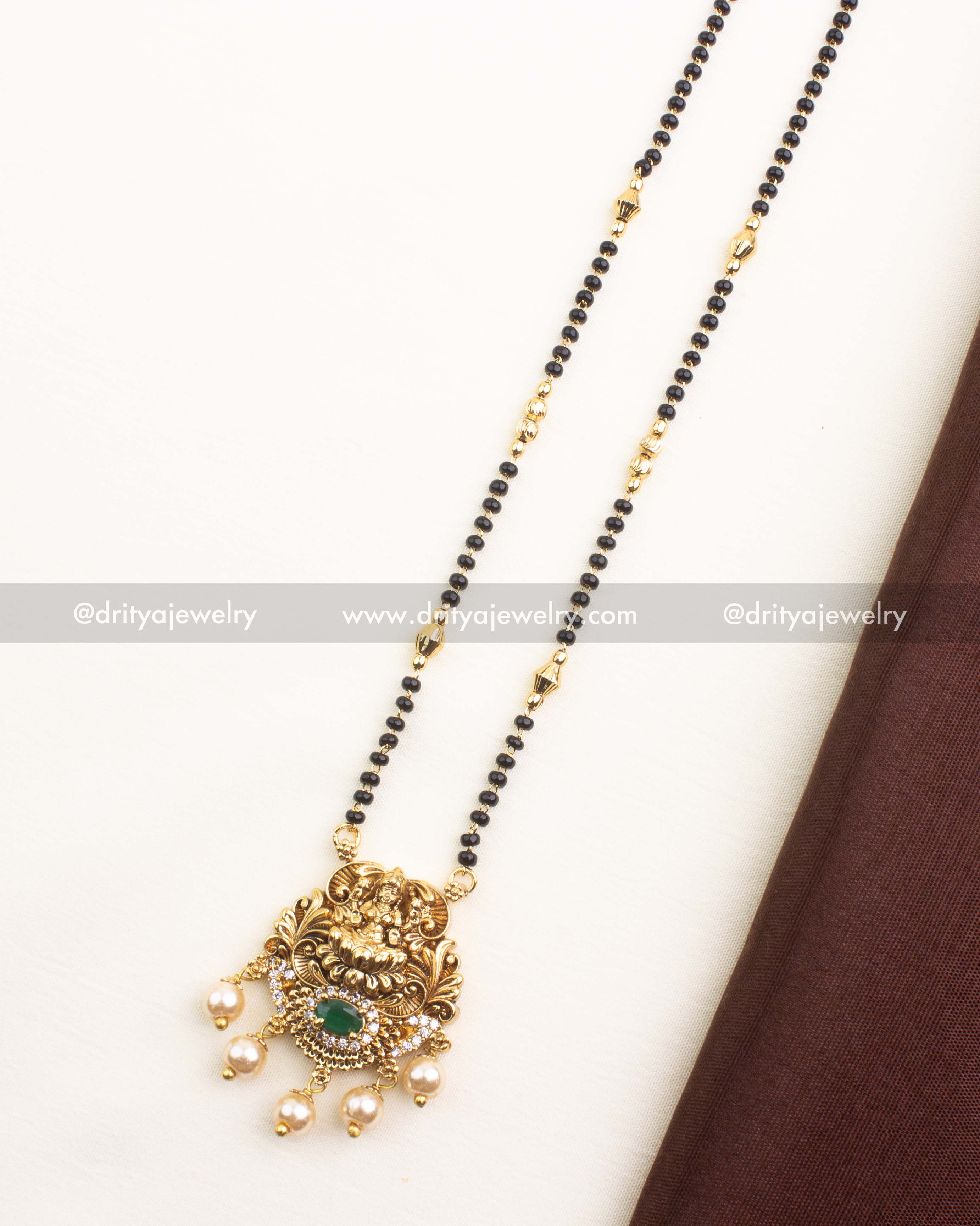 Premium Nakshi Temple Black Beads Necklace with Lakshmi Pendant and Green Stone