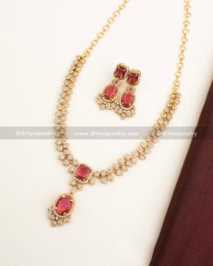 Red CZ short necklace set with ruby-coloured stones and diamond CZ clusters.