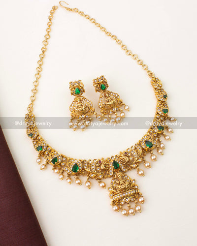 Premium Nakshi temple short necklace with emerald green stones, Lakshmi motif and pearl drops