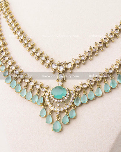 close up of Premium Victorian layered necklace set with mint green stones and gold finish