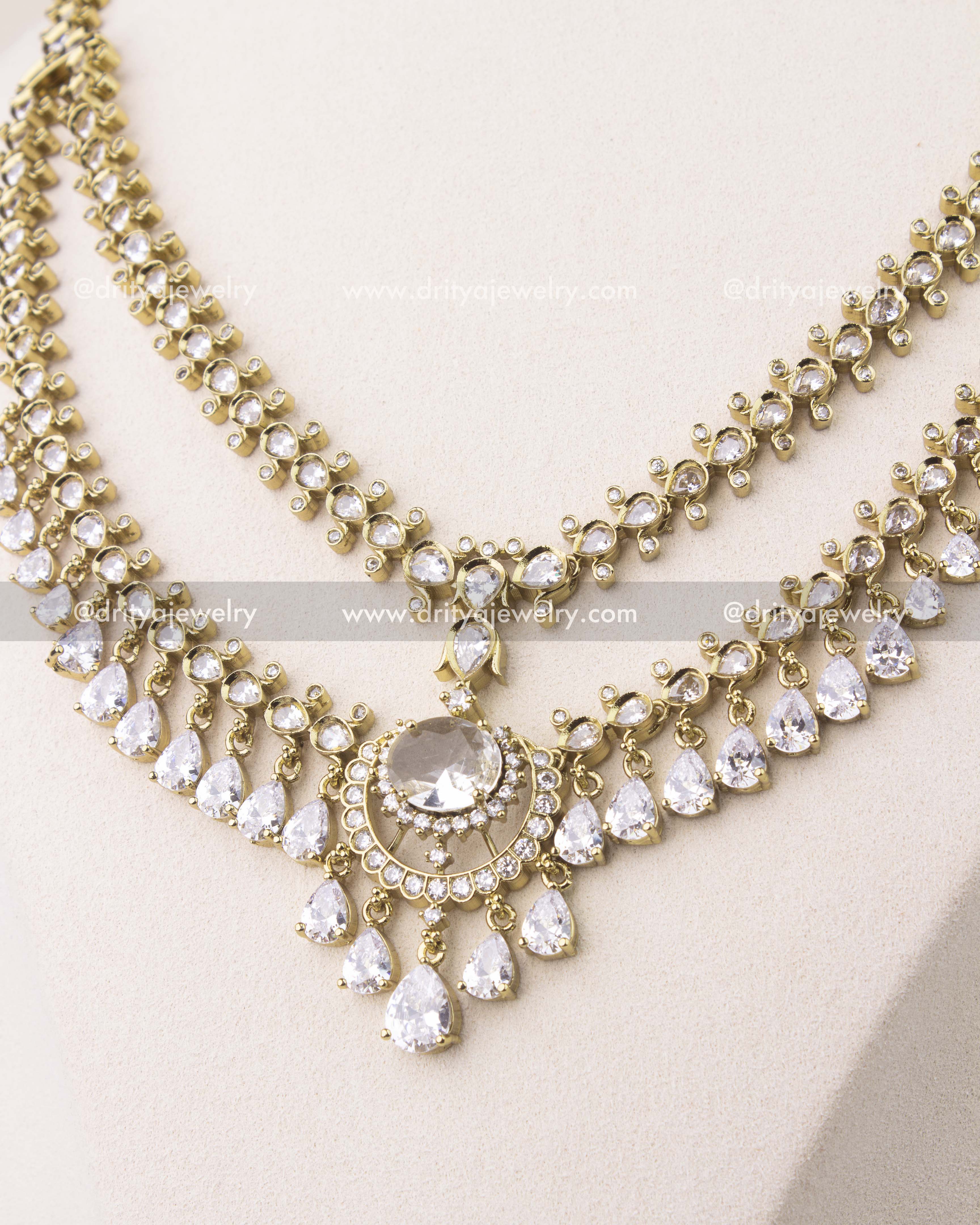 close up of Premium Victorian layered short necklace set with diamond white CZ stones